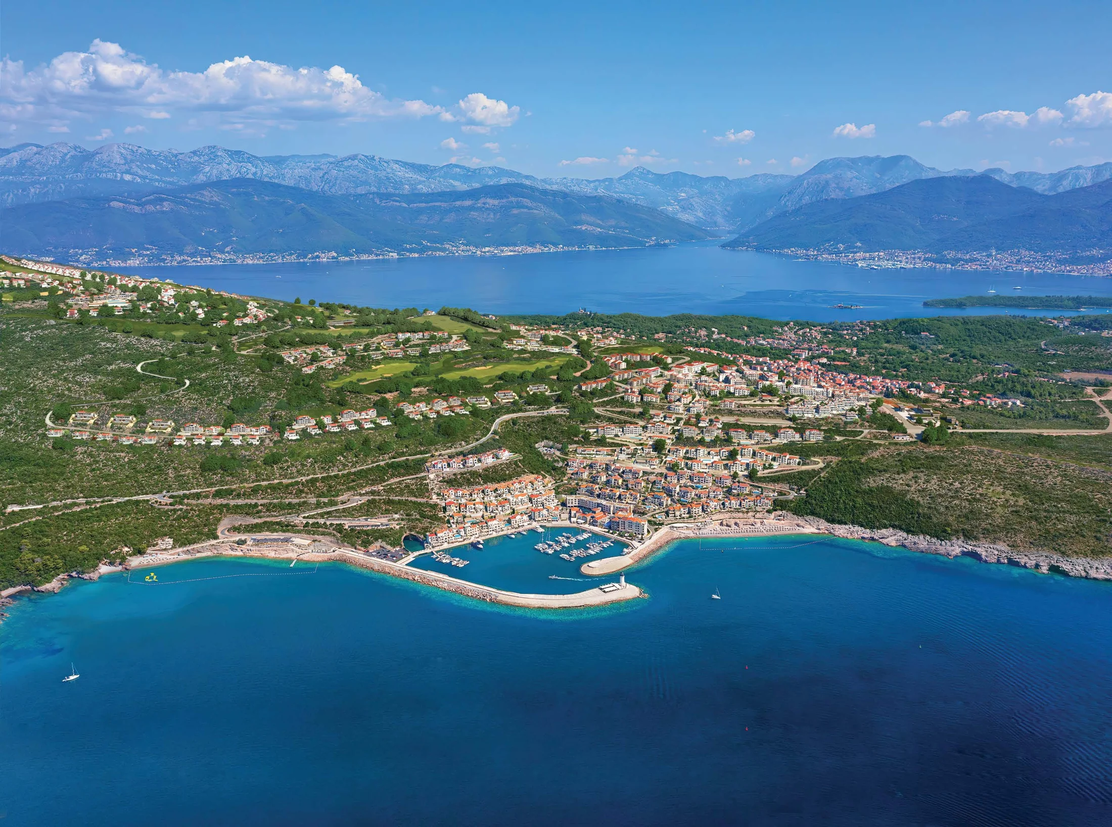 Developer aerial illustration of Luštica Bay showing The Peaks, Marina Village and Centrale